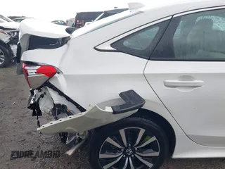 2023 Honda Civic EX z VIN 2HGFE1F79PH324822, wystawiony jako IAAI lot #42017274 z przebiegiem 36 862 mil mil oraz . Historia ofert i sprzedaży dostępna na DreamBid. Obrazek 17.