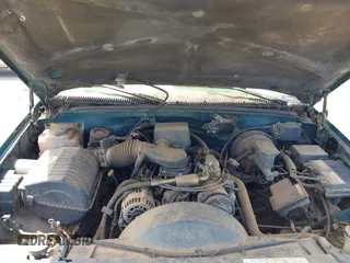 1997 GMC Suburban z VIN 1GKFK16R5VJ748880, wystawiony jako IAAI lot #41975824 z przebiegiem 302 899 mil mil oraz . Historia ofert i sprzedaży dostępna na DreamBid. Obrazek 10.