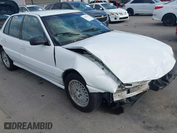 1997 Pontiac Grand Am SE with VIN 1G2NE52T3VC809661, listed as a IAAI auction lot 41100711 with 168,686 mi miles and . Bid and sale history available at DreamBid. Image 18.