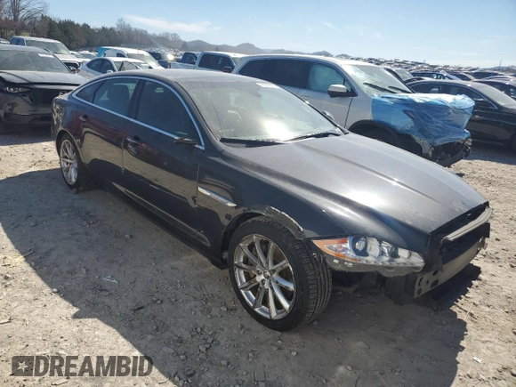 2013 Jaguar XJ Portfolio with VIN SAJWJ2GDXD8V45921, listed as a Copart auction lot 49289825 with 115,152 mi miles and Salvage title. Bid and sale history available at DreamBid. Image 4.