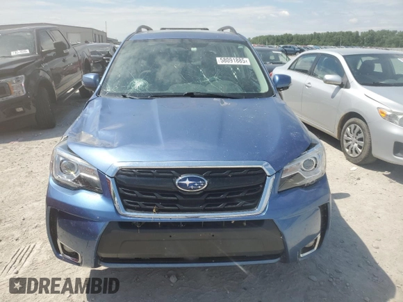 2017 Subaru Forester Touring with VIN JF2SJGTC2HH404923, listed as a Copart auction lot 58091885 with 101,317 mi miles and Salvage title. Bid and sale history available at DreamBid. Image 5.
