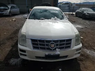 2010 Cadillac STS AWD z VIN 1G6DU6EV1A0150801, wystawiony jako Copart lot #42761515 z przebiegiem 154 865 mil mil oraz Szkoda całkowita • Salvage title. Historia ofert i sprzedaży dostępna na DreamBid. Obrazek 5.