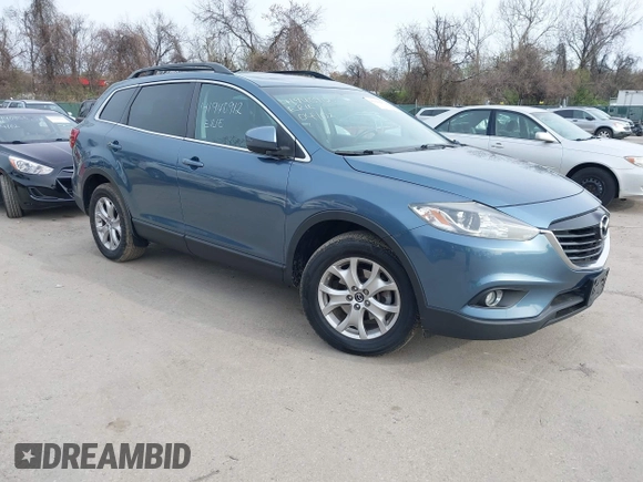 2015 Mazda CX-9 Touring with VIN JM3TB3CVXF0460959, listed as a IAAI auction lot 41940912 with 166,674 mi miles and . Bid and sale history available at DreamBid. Image 1.