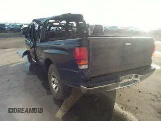 1999 Mazda B-Series 2WD Truck SE with VIN 4F4YR16V8XTM13964, listed as a IAAI auction lot 39963394 with 1 mi miles. Bid and sale history available at carsss.com. Image 3.