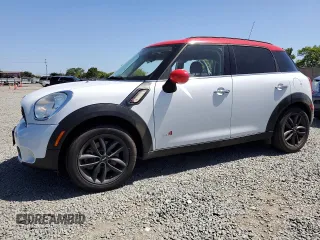 2013 MINI Countryman S ALL4 z VIN WMWZC5C56DWM16296, wystawiony jako Copart lot #56985615 z przebiegiem 63 858 mil mil oraz Szkoda całkowita • Salvage title. Historia ofert i sprzedaży dostępna na DreamBid. Obrazek 1.