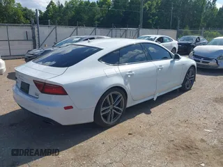2016 Audi A7 Premium Plus with VIN WAUWGAFC2GN021696, listed as a IAAI auction lot 42595234 with 112,464 mi miles and . Bid and sale history available at DreamBid. Image 4.