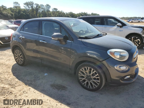 2018 FIAT 500X Lounge with VIN ZFBCFXDB5JP664130, listed as a Copart auction lot 73784574 with 67,160 mi miles and Salvage title. Bid and sale history available at DreamBid. Image 4.