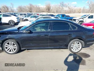 2019 Volkswagen Passat 2.0T Wolfsburg Edition with VIN 1VWLA7A32KC012841, listed as a IAAI auction lot 41539683 with 75,897 mi miles. Bid and sale history available at carsss.com. Image 14.