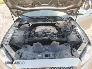 2014 Jaguar XJ Portfolio with VIN SAJWJ2GD7E8V61558, listed as a Copart auction lot 66850034 with 130,984 mi miles and Salvage title. Bid and sale history available at DreamBid. Image 13.