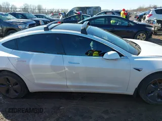 2020 Tesla Model 3 Long Range with VIN 5YJ3E1EB9LF735340, listed as a IAAI auction lot 41765919 with Not Provided miles. Bid and sale history available at carsss.com. Image 13.