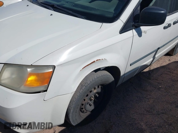 2008 Dodge Grand Caravan SE with VIN 2D8HN44H28R677422, listed as a IAAI auction lot 42084681 with 249,115 mi miles and . Bid and sale history available at DreamBid. Image 12.