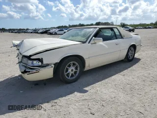 2002 Cadillac Eldorado z VIN 1G6EC12982B106768, wystawiony jako Copart lot #44581685 z przebiegiem Nie podano mil oraz Szkoda całkowita • Salvage title. Historia ofert i sprzedaży dostępna na DreamBid. Obrazek 1.