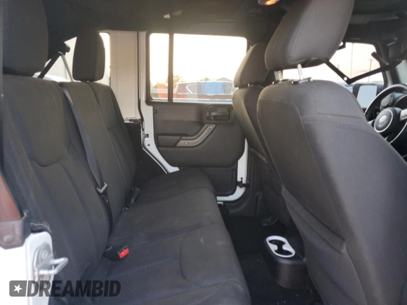 2017 Jeep Wrangler Unlimited Sport with VIN 1C4BJWDG8HL557698, listed as a Copart auction lot 61863415 with 94,335 mi miles and Salvage title. Bid and sale history available at DreamBid. Image 11.