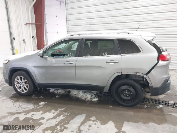 2014 Jeep Cherokee Latitude with VIN 1C4PJMCS9EW124434, listed as a IAAI auction lot 41582319 with 123,372 mi miles. Bid and sale history available at carsss.com. Image 14.