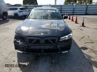 2023 BMW 3 Series 330i with VIN 3MW69FF05P8D21152, listed as a Copart auction lot 48803345 with 21,146 mi miles and Salvage title. Bid and sale history available at DreamBid. Image 5.