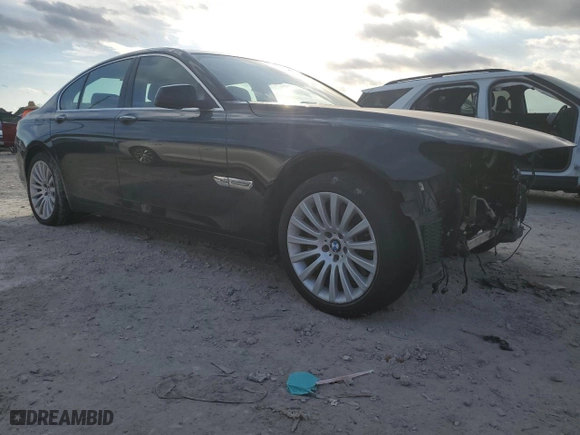 2012 BMW 7 Series 750i xDrive with VIN WBAKC6C58CC396835, listed as a Copart auction lot 86833724 with 0 mi miles and Salvage Title. Bid and sale history available at carsss.com. Image 4.