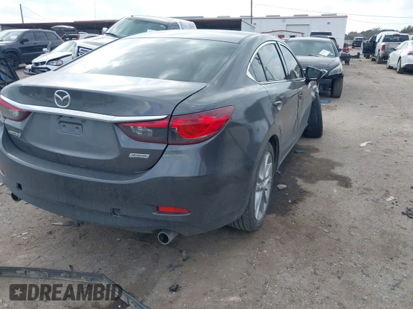 2017 Mazda 6 Touring with VIN JM1GL1V57H1127804, listed as a IAAI auction lot 41515342 with 107,336 mi miles and . Bid and sale history available at carsss.com. Image 4.