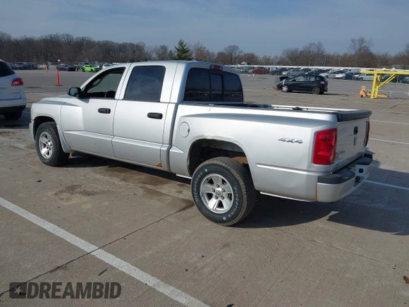 2008 Dodge Dakota SLT with VIN 1D7HW48N08S626761, listed as a IAAI auction lot 41794557 with 104,195 mi miles and . Bid and sale history available at DreamBid. Image 3.