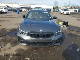 2021 BMW 3 Series 330i xDrive with VIN 3MW5R7J05M8C01209, listed as a Copart auction lot 50450775 with Not Provided miles and Salvage Title. Bid and sale history available at carsss.com. Image 5.