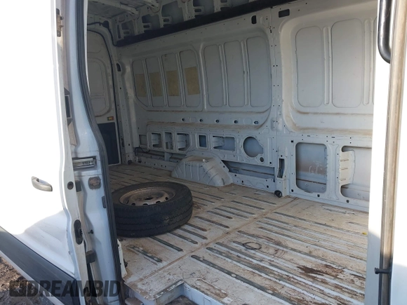 2022 Ford Transit Cargo z VIN 1FTBR3X8XNKA71066, wystawiony jako IAAI lot #41771120 z przebiegiem 87 702 mil mil oraz . Historia ofert i sprzedaży dostępna na DreamBid. Obrazek 7.