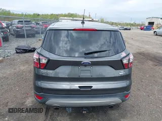 2017 Ford Escape SE with VIN 1FMCU9GD1HUC27843, listed as a IAAI auction lot 42009686 with 111,290 mi miles and . Bid and sale history available at DreamBid. Image 16.
