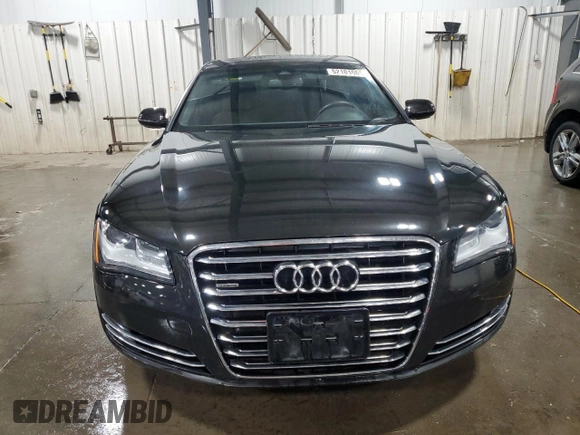 2011 Audi A8 z VIN WAURVAFD8BN005569, wystawiony jako Copart lot #52101065 z przebiegiem 104 893 mil mil oraz Szkody całkowita. Historia ofert i sprzedaży dostępna na DreamBid. Obrazek 5.