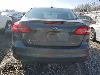 2016 Ford Focus SE with VIN 1FADP3F23GL384944, listed as a Copart auction lot 49876395 with 74,087 mi miles and Salvage title. Bid and sale history available at DreamBid. Image 6.