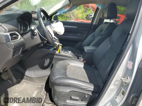 2021 Mazda CX-5 Touring z VIN JM3KFBCM1M0343804, wystawiony jako Copart lot #56194795 z przebiegiem 100 039 mil mil oraz Tytuł czysty. Historia ofert i sprzedaży dostępna na DreamBid. Obrazek 7.