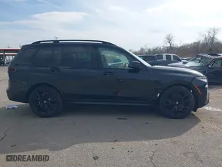 2025 BMW X7 xDrive40i with VIN 5UX23EM04S9X31373, listed as a IAAI auction lot 41429790 with 1,880 mi miles. Bid and sale history available at carsss.com. Image 13.