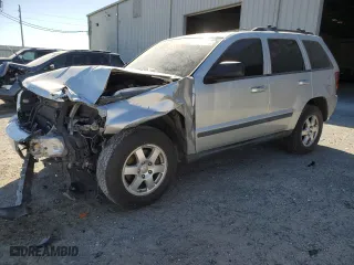 2009 Jeep Grand Cherokee Laredo with VIN 1J8GS48KX9C514254, listed as a Copart auction lot 49809175 with 293,040 mi miles and Salvage Title. Bid and sale history available at carsss.com. Image 1.