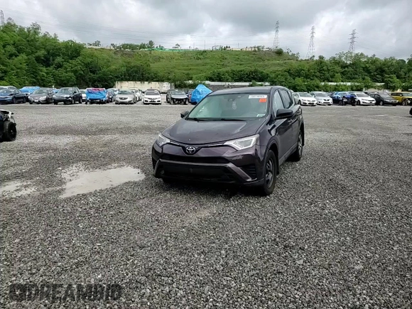 2018 Toyota RAV4 LE with VIN 2T3BFREV5JW721315, listed as a Copart auction lot 59016665 with 136,490 mi miles and Salvage title. Bid and sale history available at DreamBid. Image 14.