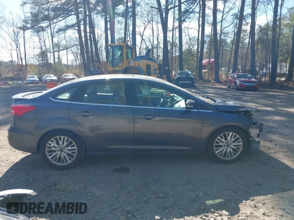 2015 Ford Focus Titanium with VIN 1FADP3J25FL333743, listed as a IAAI auction lot 41857057 with 120,917 mi miles and . Bid and sale history available at carsss.com. Image 14.