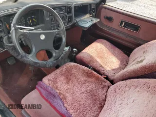 1987 Saab 900 z VIN YS3AR35J5H3010183, wystawiony jako Copart lot #70003404 z przebiegiem 138 740 mil mil oraz Czysty tytuł • Clean title. Historia ofert i sprzedaży dostępna na DreamBid. Obrazek 8.