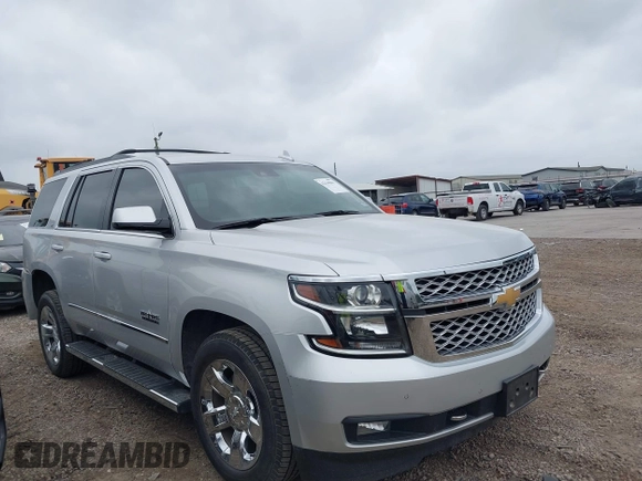 2019 Chevrolet Tahoe LT z VIN 1GNSCBKC1KR191789, wystawiony jako IAAI lot #42144961 z przebiegiem 94 178 mil mil oraz . Historia ofert i sprzedaży dostępna na DreamBid. Obrazek 13.