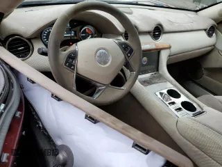 2012 Fisker Karma EcoChic z VIN YH4K16AAXCA001340, wystawiony jako Copart lot #78439634 z przebiegiem 70 515 mil mil oraz Szkody całkowita. Historia ofert i sprzedaży dostępna na DreamBid. Obrazek 8.