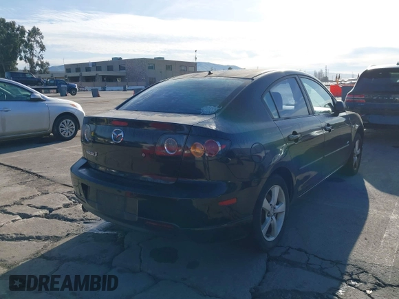 2005 Mazda 3 s with VIN JM1BK323751254849, listed as a IAAI auction lot 41645553 with 241,527 mi miles. Bid and sale history available at carsss.com. Image 4.