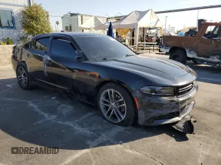 2019 Dodge Charger SXT with VIN 2C3CDXJG8KH757818, listed as a Copart auction lot 49518475 with 98,129 mi miles and Salvage Title. Bid and sale history available at DreamBid. Image 4.