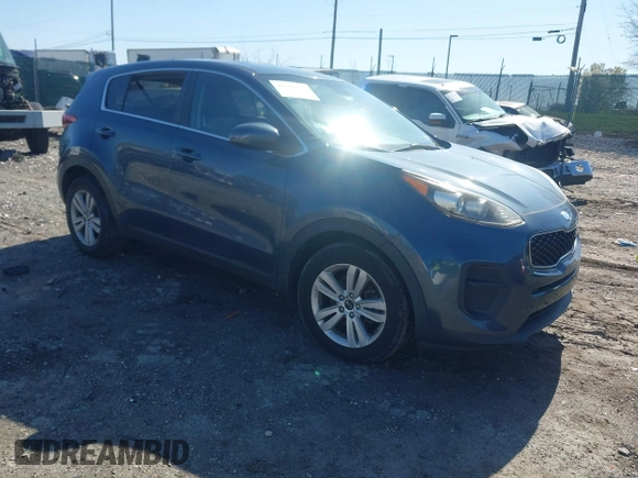 2018 Kia Sportage LX with VIN KNDPM3AC1J7424163, listed as a IAAI auction lot 41989534 with 87,220 mi miles and . Bid and sale history available at carsss.com. Image 1.