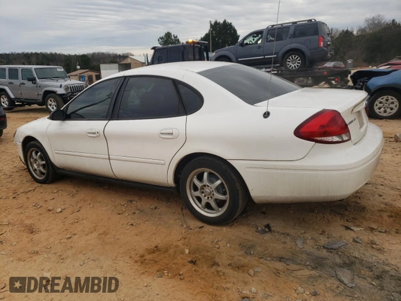 2004 Ford Taurus z VIN 1FAFP52214A194125, wystawiony jako Copart lot #43234295 z przebiegiem 216 877 mil mil oraz Szkody całkowita. Historia ofert i sprzedaży dostępna na DreamBid. Obrazek 2.