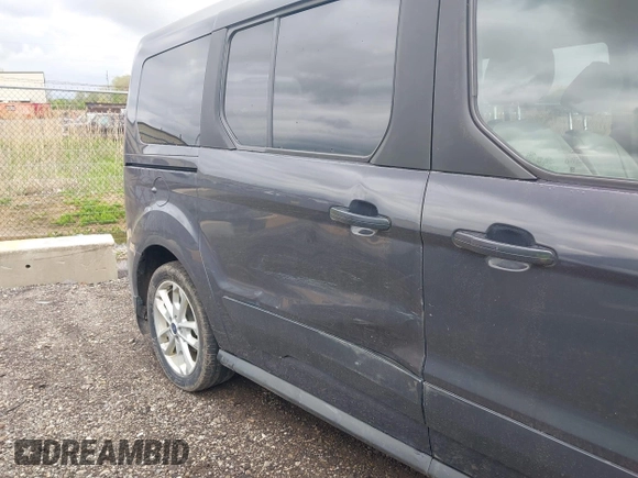 2014 Ford Transit Connect XLT z VIN NM0GE9F7XE1147658, wystawiony jako IAAI lot #42202490 z przebiegiem 196 748 mil mil oraz . Historia ofert i sprzedaży dostępna na DreamBid. Obrazek 6.