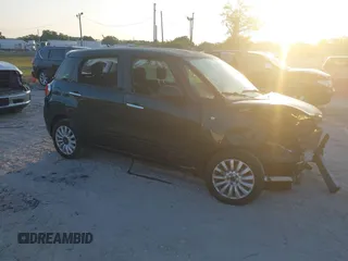 2014 FIAT 500L Easy with VIN ZFBCFABH8EZ003450, listed as a IAAI auction lot 42048537 with 86,943 mi miles and . Bid and sale history available at DreamBid. Image 1.