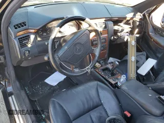 1998 Mercedes-Benz E-Class with VIN WDBJF65F8WA591263, listed as a Copart auction lot 77790804 with 204,821 mi miles and Non Repairable. Bid and sale history available at carsss.com. Image 8.