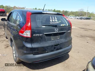 2014 Honda CR-V LX with VIN 2HKRM4H35EH607703, listed as a IAAI auction lot 42162568 with 174,238 mi miles and . Bid and sale history available at carsss.com. Image 16.