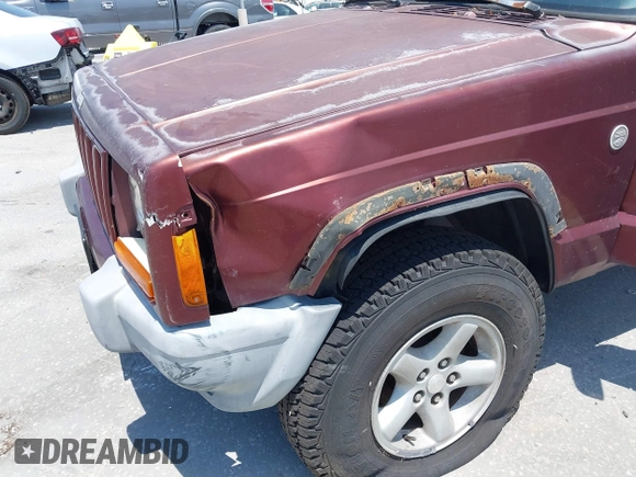 2000 Jeep Cherokee z VIN 1J4FF48S7YL129654, wystawiony jako IAAI lot #42201026 z przebiegiem 272 922 mil mil oraz . Historia ofert i sprzedaży dostępna na DreamBid. Obrazek 6.