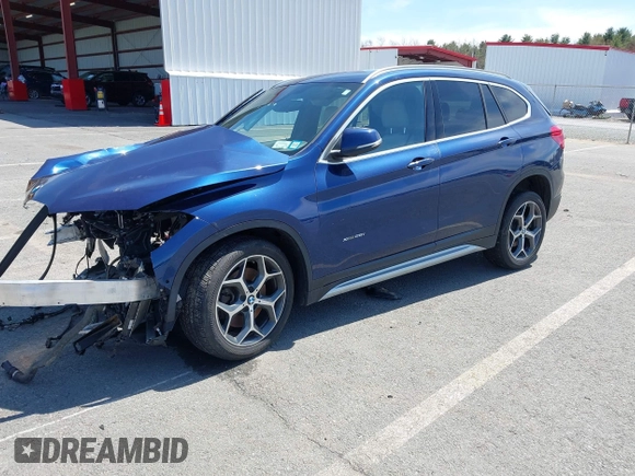2017 BMW X1 xDrive28i with VIN WBXHT3C39H5F71525, listed as a IAAI auction lot 42050272 with 118,875 mi miles. Bid and sale history available at carsss.com. Image 2.