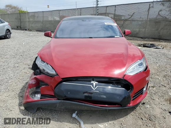 2016 Tesla Model S 90D with VIN 5YJSA1E42GF127593, listed as a Copart auction lot 52450495 with 144,151 mi miles and Salvage title. Bid and sale history available at DreamBid. Image 5.