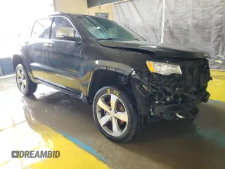 2015 Jeep Grand Cherokee Overland with VIN 1C4RJFCG8FC653117, listed as a Copart auction lot 49254595 with 142,359 mi miles and Clean Title. Bid and sale history available at carsss.com. Image 4.