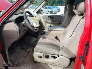 2003 Ford F-150 XL with VIN 1FTRX07WX3KD51374, listed as a Copart auction lot 71796464 with 130,319 mi miles and Salvage Title. Bid and sale history available at carsss.com. Image 7.