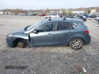 2012 Mazda Mazda3 i Touring with VIN JM1BL1L81C1651952, listed as a IAAI auction lot 40863599 with 242,296 mi miles. Bid and sale history available at carsss.com. Image 14.