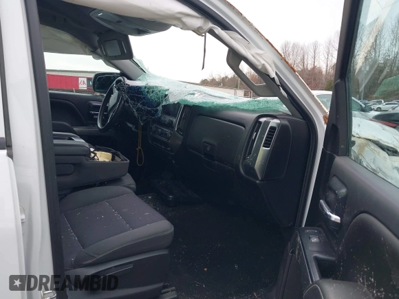 2018 Chevrolet Silverado 1500 LT with VIN 1GCUKREC0JF208509, listed as a IAAI auction lot 41794616 with 96,962 mi miles and . Bid and sale history available at DreamBid. Image 5.